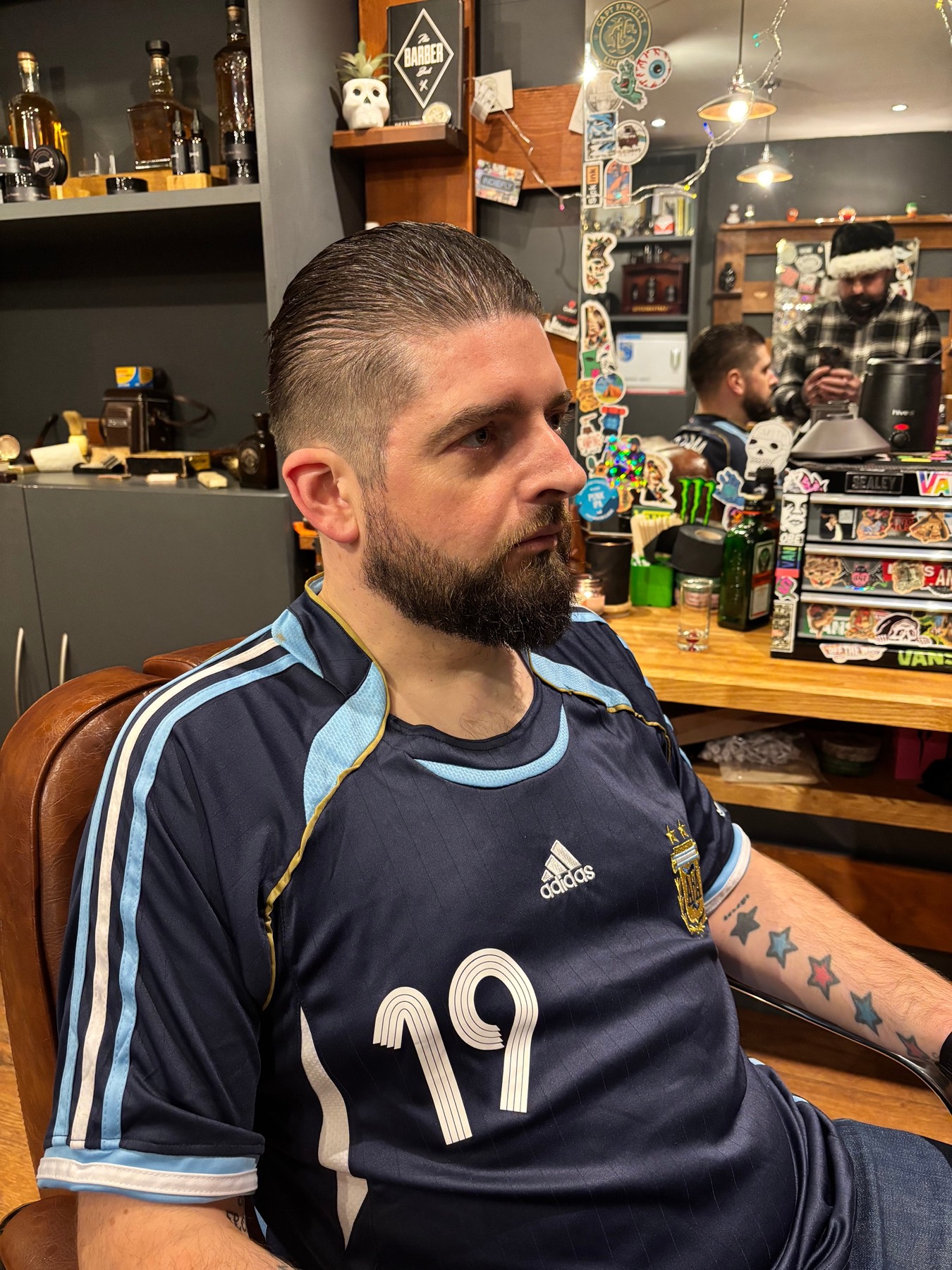 Fresh haircut portrait in barber chair