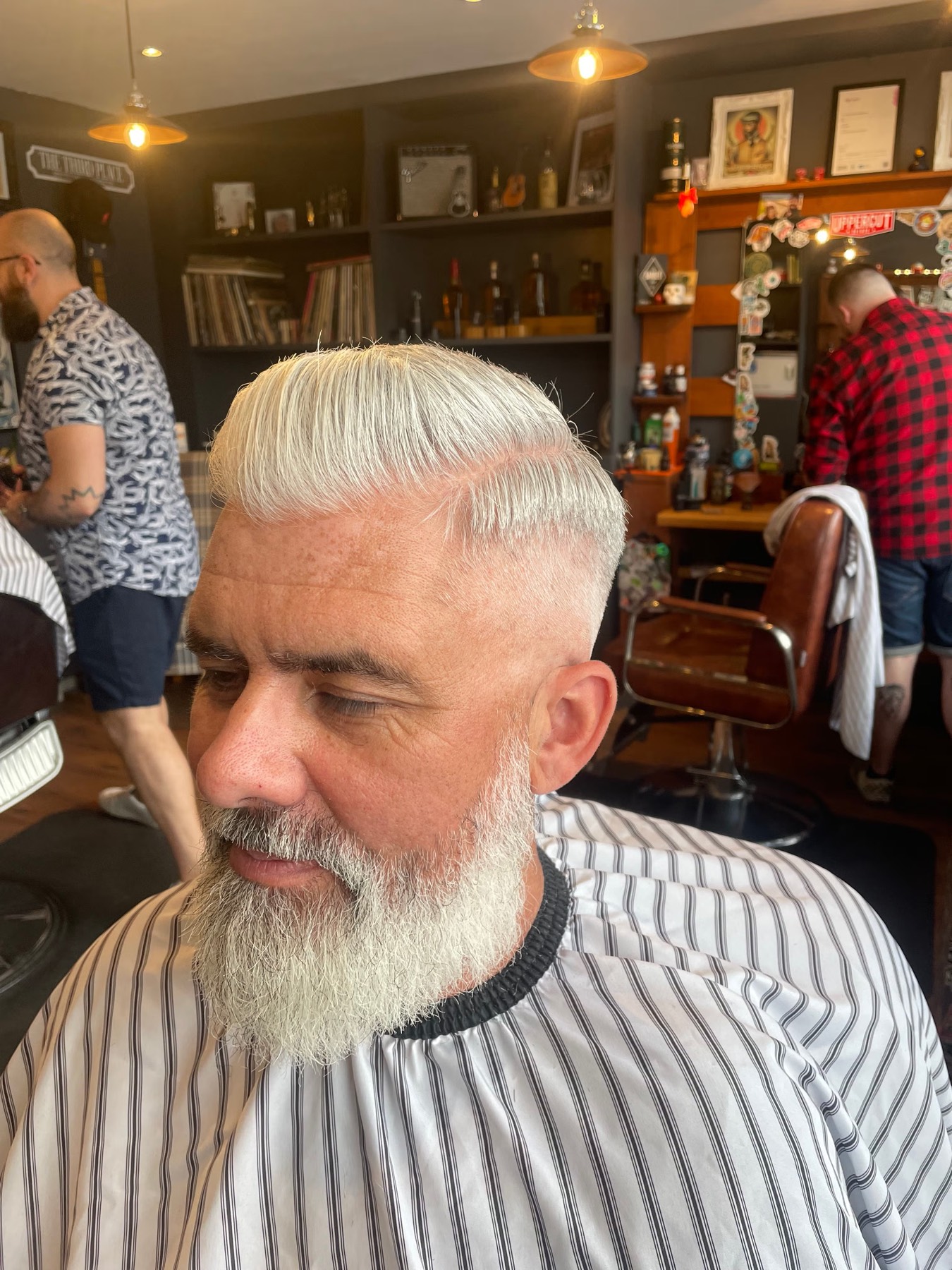 Finished haircut and beard with shop atmosphere